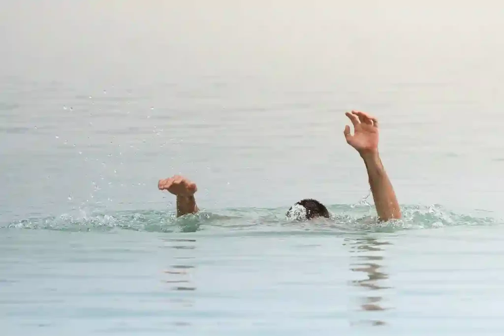 man drowning in an ocean